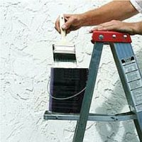 Painting on a ladder